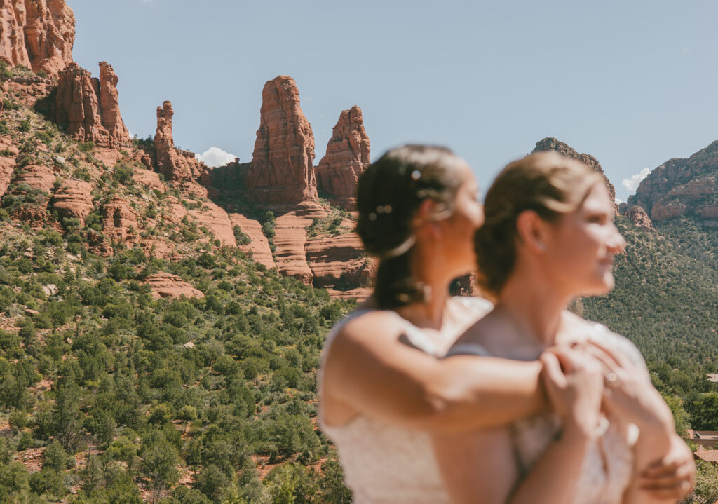 Romantic Sedona Arizona elopement for brides, Miki and Morgan with a rock formation view