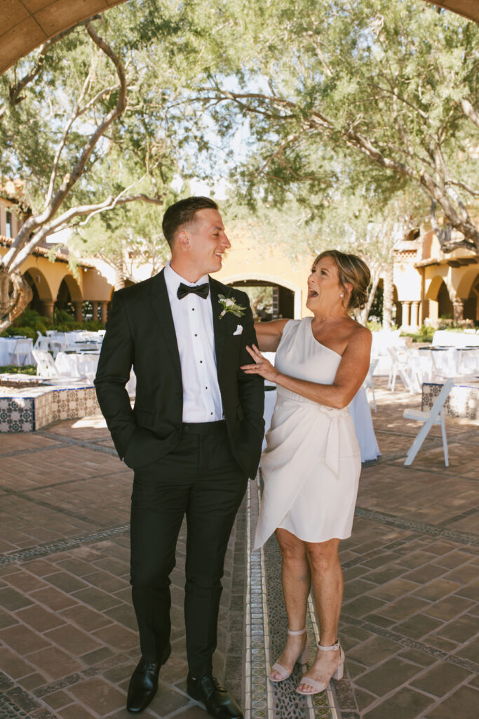 Mother's first look with Groom during Romantic wedding photography in Phoenix