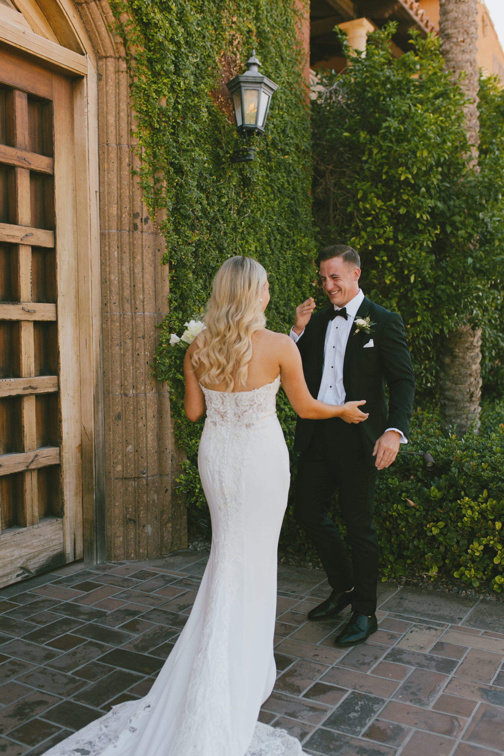 Matt and Alexa Bride and Groom emotional first look with Romantic wedding photography in Phoenix