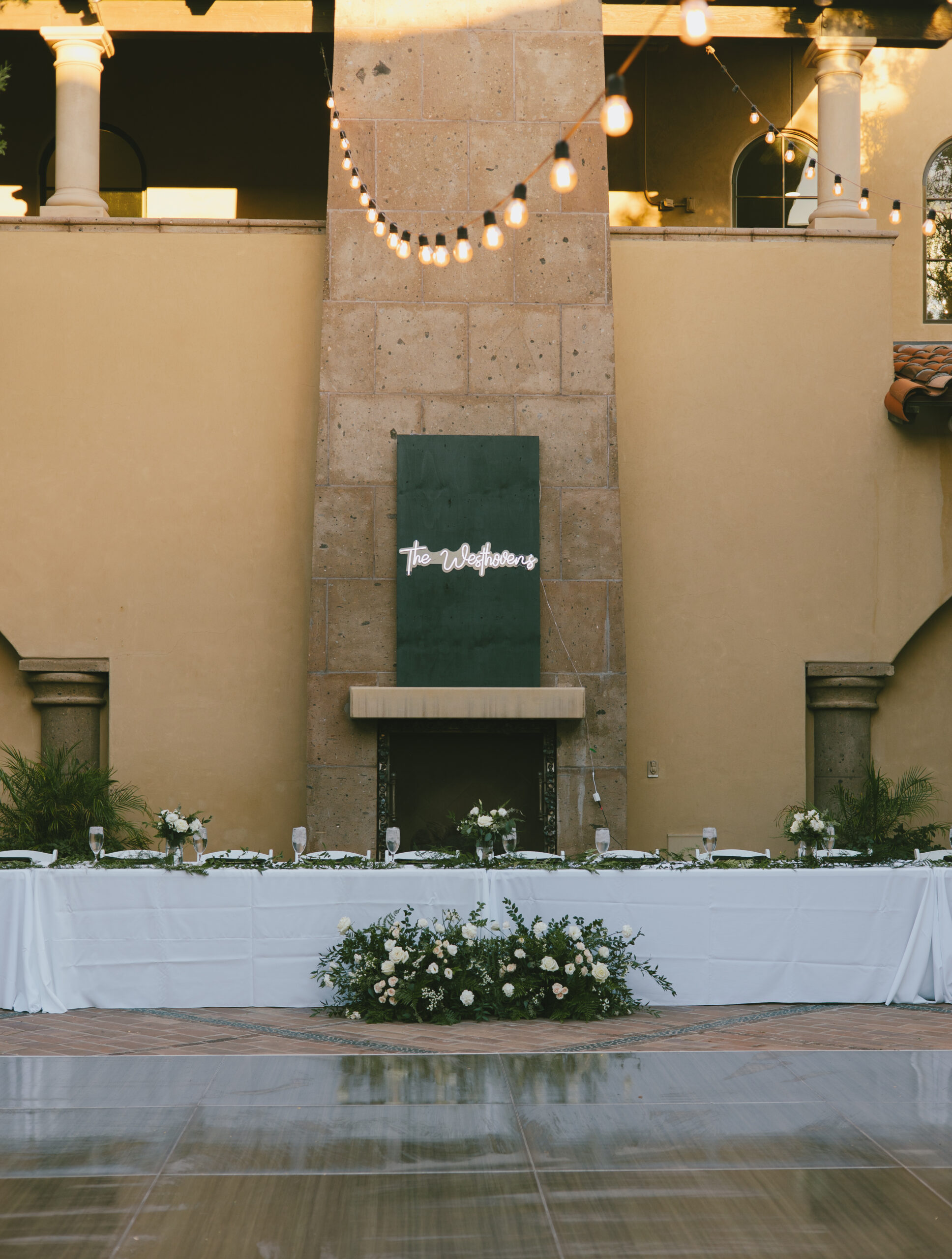 Matt and Alexa Timeless wedding head table setting details with black gold and greenery photography in Phoenix