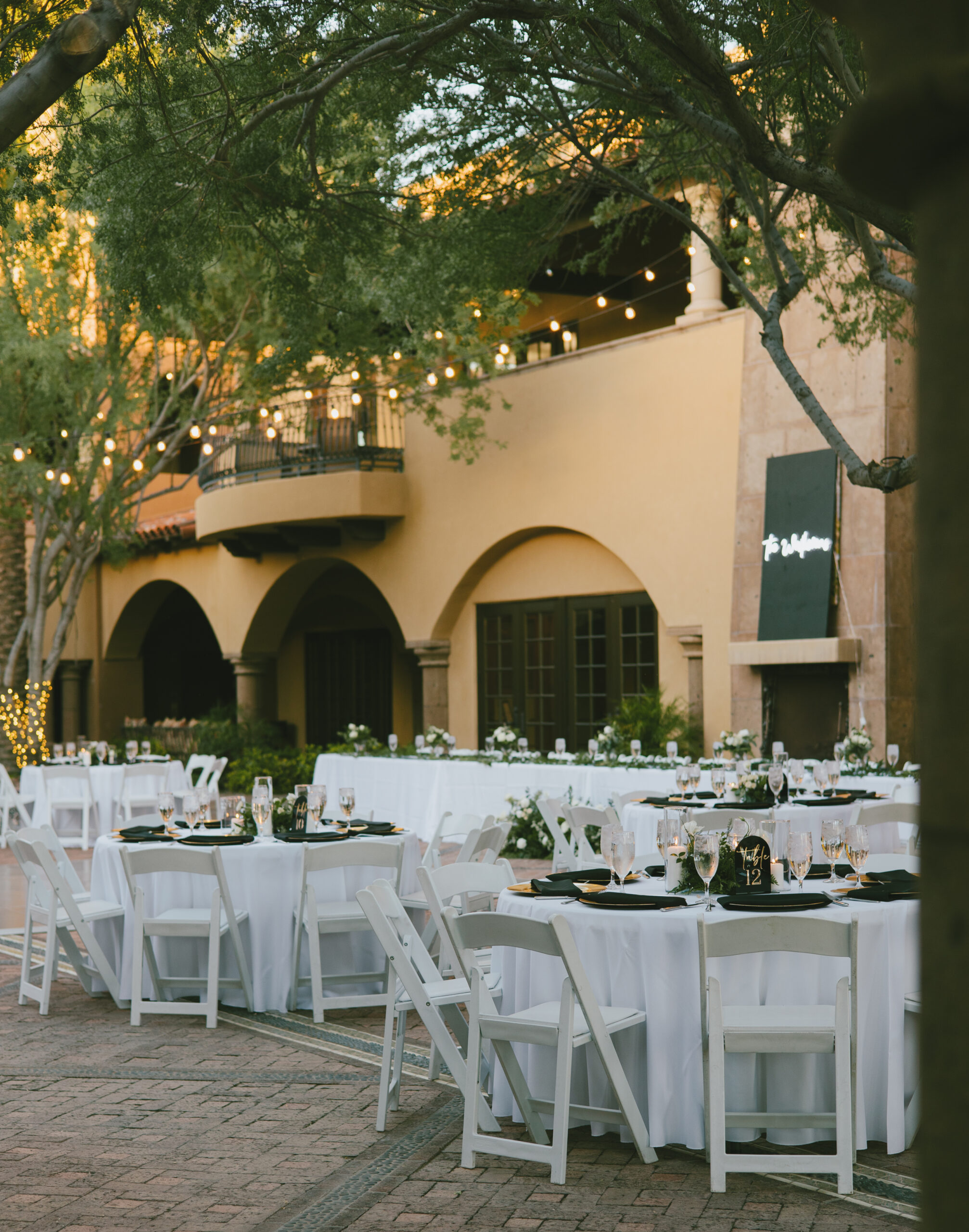 Matt and Alexa Modern wedding table setting details with black gold and greenery photography in Phoenix