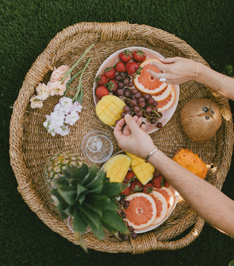 Include a prop in your engagement session. Using a fruit tray or charcuterie board