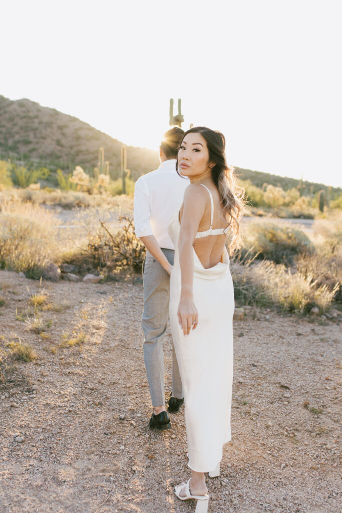 J and Alice's Arizona Engagement Session. J is leading A during sunrise