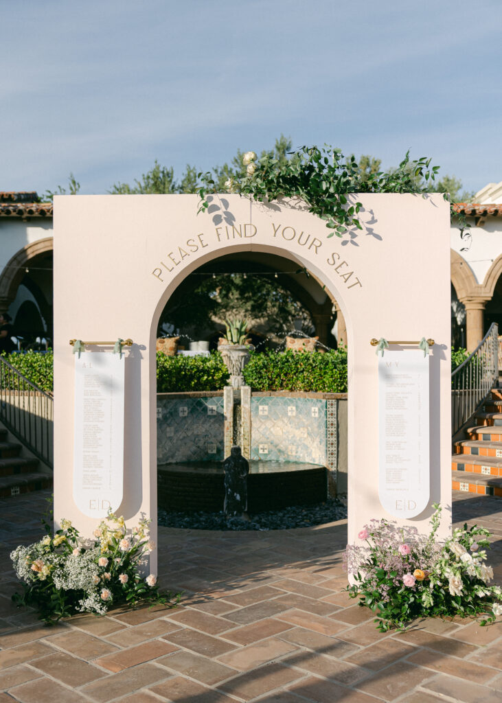 A wedding welcome sign and seating chart installation in Phoenix, AZ.