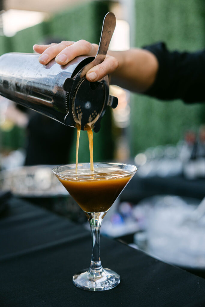 Espresso martini being expertly made during wedding cocktail hour at the Arizona Biltmore, showcasing elegant drink preparation and luxury event details.